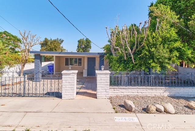 68600 E St, Cathedral City, CA 92234 - view of front facade with a fenced front yard