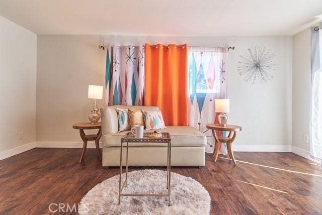 68600 E St, Cathedral City, CA 92234 - sitting room featuring wood finished floors and baseboards