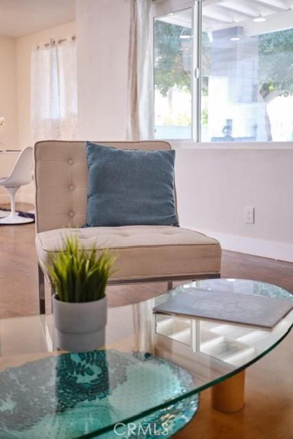 68600 E St, Cathedral City, CA 92234 - sitting room with baseboards and wood finished floors