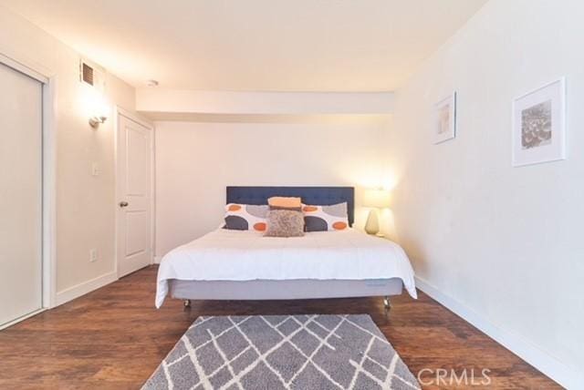 68600 E St, Cathedral City, CA 92234 - bedroom featuring wood finished floors and baseboards