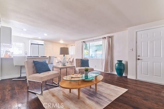 68600 E St, Cathedral City, CA 92234 - living area featuring wood finished floors, baseboards, and recessed lighting