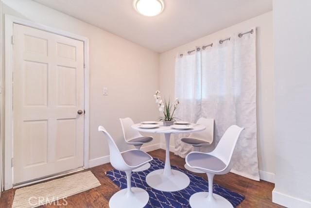 68600 E St, Cathedral City, CA 92234 - dining area with wood finished floors and baseboards