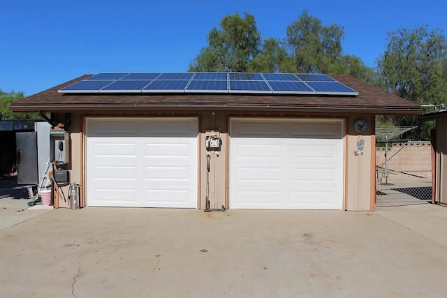 13853 Charlann Rd, Valley Center, CA 92082 - garage featuring solar panels and concrete driveway