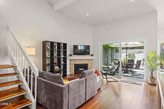 483 Broderick Way, Port Hueneme, CA 93041 - living room with a high ceiling, stairs, wood finished floors, a fireplace, and beamed ceiling