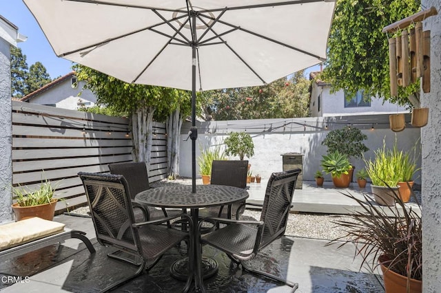 483 Broderick Way, Port Hueneme, CA 93041 - fenced backyard with outdoor dining area and a patio area