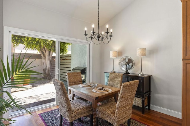 483 Broderick Way, Port Hueneme, CA 93041 - dining area featuring a chandelier, dark wood-style flooring, baseboards, and high vaulted ceiling