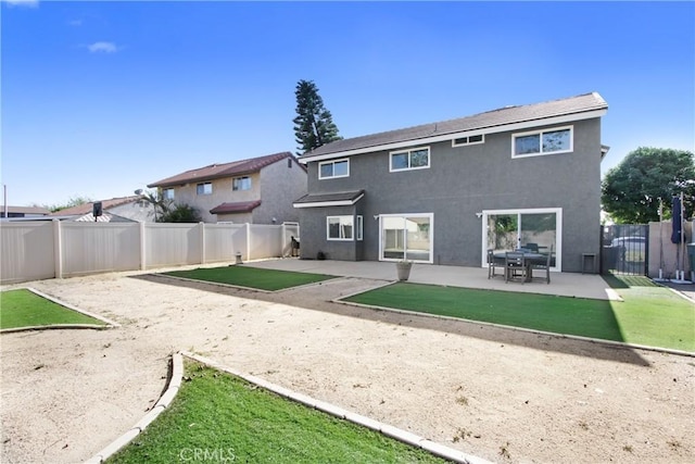 968 N Darfield Ave, Covina, CA 91724 - rear view of property with stucco siding, a patio, and a fenced backyard