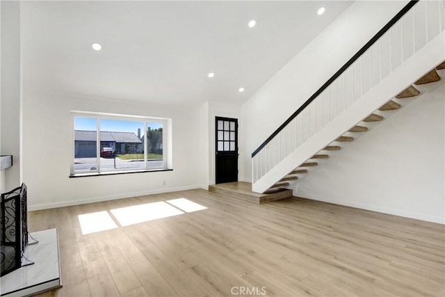 968 N Darfield Ave, Covina, CA 91724 - foyer entrance with stairs, wood finished floors, recessed lighting, and baseboards