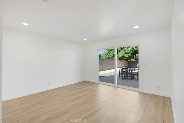 968 N Darfield Ave, Covina, CA 91724 - empty room featuring light wood-style flooring, baseboards, and recessed lighting