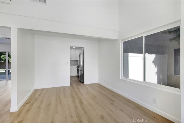 968 N Darfield Ave, Covina, CA 91724 - unfurnished room with light wood-type flooring and baseboards