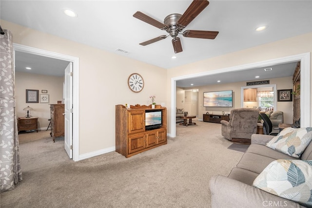 5323 Fidler Ave, Lakewood, CA 90712 - living room with light colored carpet, a ceiling fan, recessed lighting, and baseboards