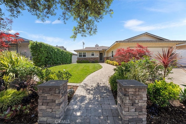 5323 Fidler Ave, Lakewood, CA 90712 - view of green lawn featuring a garage