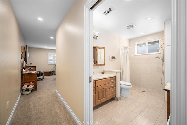 5323 Fidler Ave, Lakewood, CA 90712 - bathroom featuring vanity, toilet, curtained shower, and recessed lighting