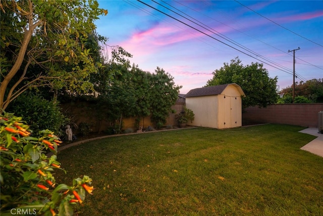 5323 Fidler Ave, Lakewood, CA 90712 - yard at dusk featuring central AC