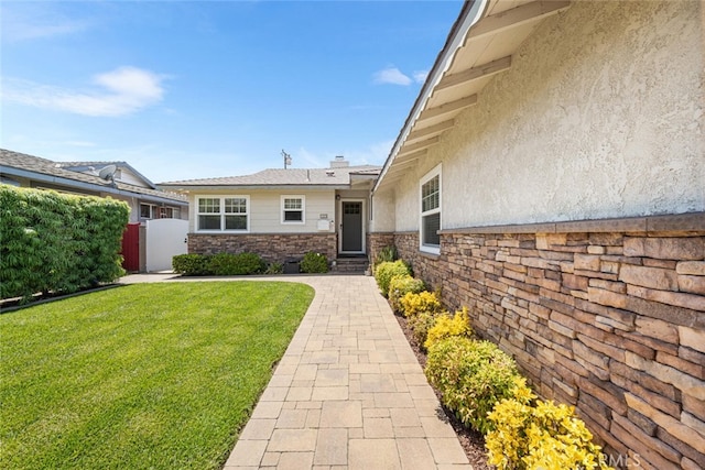 5323 Fidler Ave, Lakewood, CA 90712 - doorway to property featuring stucco siding and stone siding
