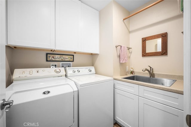 5323 Fidler Ave, Lakewood, CA 90712 - laundry room featuring washing machine and dryer and cabinet space