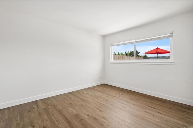 6443 Mount Ackerman Dr, San Diego, CA 92111 - spare room featuring wood finished floors and baseboards