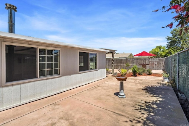 6443 Mount Ackerman Dr, San Diego, CA 92111 - fenced backyard with a patio