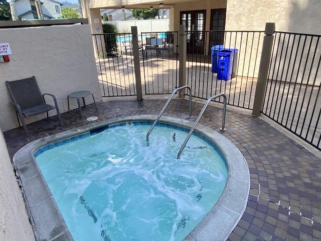 3252 Via Marin Unit 9, La Jolla, CA 92037 - view of swimming pool with a swimming pool, french doors, and a community hot tub