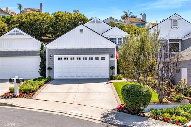 33976 Cape Cv, Dana Point, CA 92629 - view of front of property with driveway and an attached garage