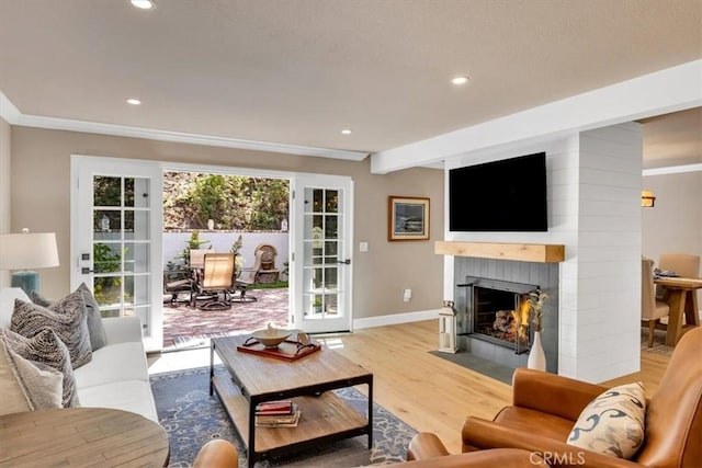 33976 Cape Cv, Dana Point, CA 92629 - living room with wood finished floors, recessed lighting, a fireplace, baseboards, and crown molding