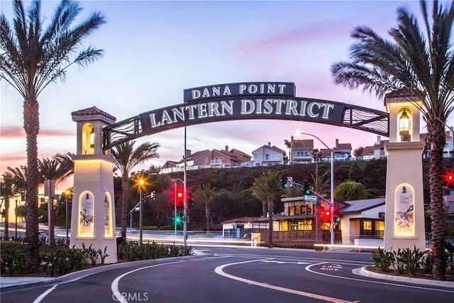 33976 Cape Cv, Dana Point, CA 92629 - view of asphalt street with traffic lights, curbs, and street lights