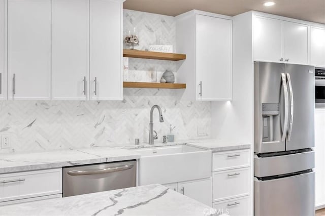 33976 Cape Cv, Dana Point, CA 92629 - kitchen featuring stainless steel appliances, white cabinets, light stone countertops, open shelves, and recessed lighting