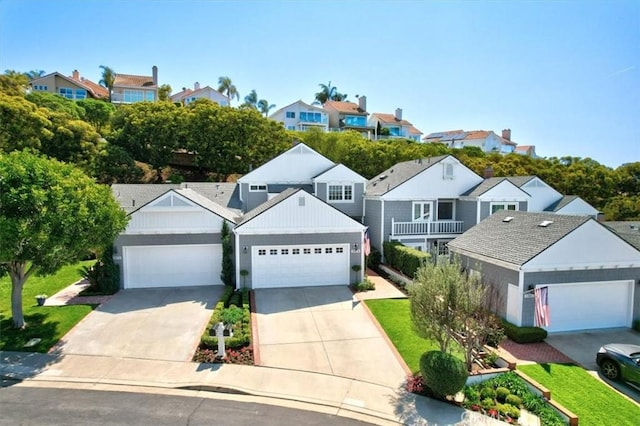 33976 Cape Cv, Dana Point, CA 92629 - traditional-style home featuring a residential view, a garage, and board and batten siding