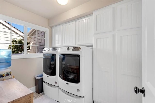 33976 Cape Cv, Dana Point, CA 92629 - washroom with washer and clothes dryer, cabinet space, and baseboards