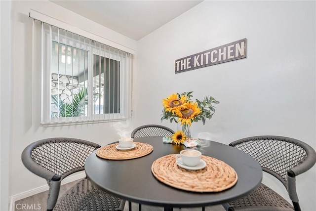 557 S Gardner Dr, Orange, CA 92866 - dining room featuring wood finished floors and baseboards
