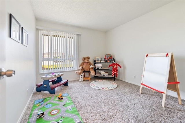 557 S Gardner Dr, Orange, CA 92866 - recreation room with carpet, a textured ceiling, and baseboards