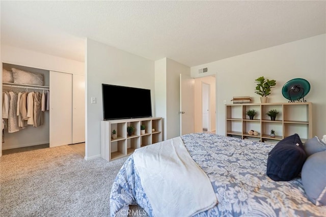 557 S Gardner Dr, Orange, CA 92866 - bedroom with carpet floors, a closet, baseboards, and a textured ceiling