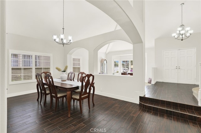 4 Westgate, Laguna Niguel, CA 92677 - dining room with a chandelier, dark wood-type flooring, baseboards, and a high ceiling