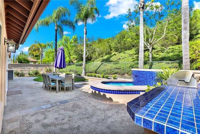 4 Westgate, Laguna Niguel, CA 92677 - fenced backyard with a patio, outdoor dining area, a hot tub, and area for grilling