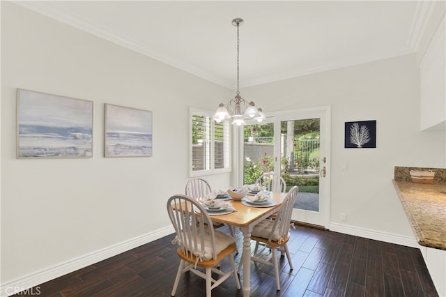 4 Westgate, Laguna Niguel, CA 92677 - dining space featuring baseboards, a chandelier, dark wood-style floors, and ornamental molding