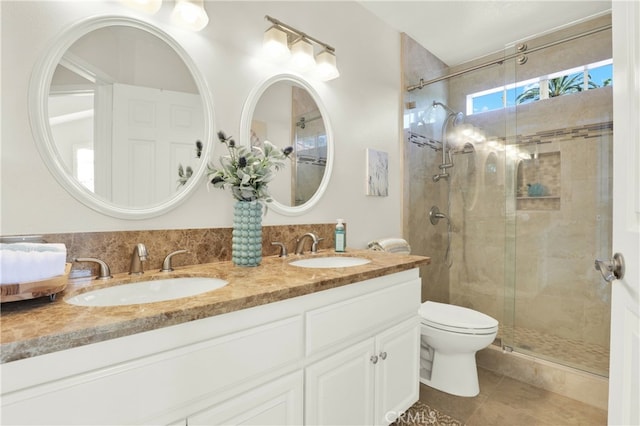 4 Westgate, Laguna Niguel, CA 92677 - full bath featuring a stall shower, double vanity, toilet, and tile patterned flooring