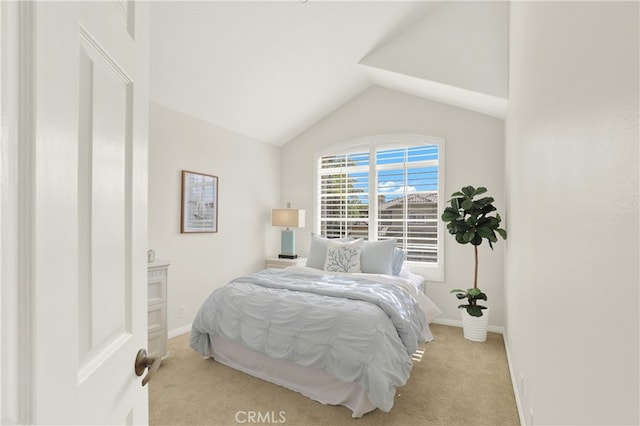 4 Westgate, Laguna Niguel, CA 92677 - bedroom with lofted ceiling, light carpet, and baseboards