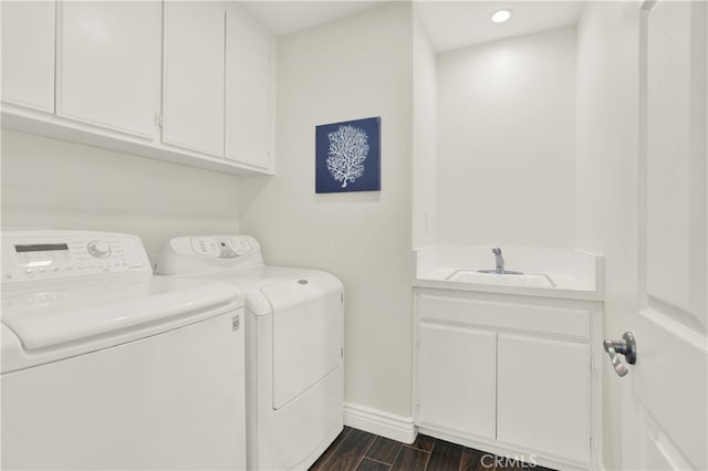 4 Westgate, Laguna Niguel, CA 92677 - washroom featuring washing machine and dryer, cabinet space, dark wood-style flooring, baseboards, and recessed lighting