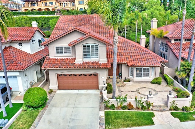 4 Westgate, Laguna Niguel, CA 92677 - mediterranean / spanish house featuring a tile roof, driveway, a garage, and stucco siding