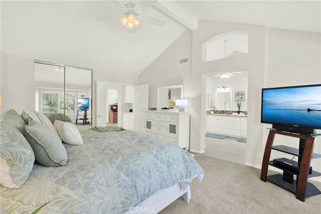 4 Westgate, Laguna Niguel, CA 92677 - bedroom with light carpet, beamed ceiling, high vaulted ceiling, ensuite bathroom, and baseboards