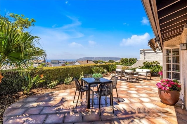 24155 Vis D Onde, Dana Point, CA 92629 - fenced backyard with a patio, an outdoor living space, outdoor dining area, and a mountain view