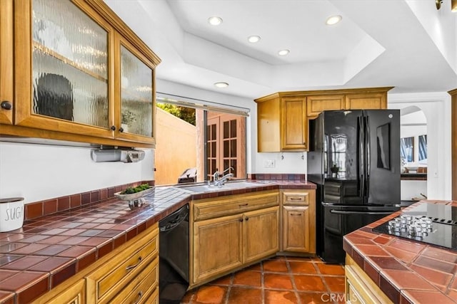 24155 Vis D Onde, Dana Point, CA 92629 - kitchen with black appliances, tile countertops, a sink, brown cabinetry, and recessed lighting
