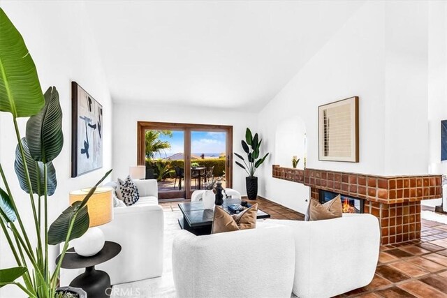 24155 Vis D Onde, Dana Point, CA 92629 - living area with lofted ceiling and a fireplace