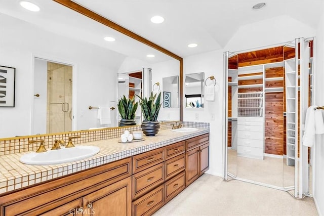 24155 Vis D Onde, Dana Point, CA 92629 - bathroom featuring double vanity, a shower stall, recessed lighting, and vaulted ceiling