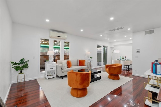4906 W 5th St Unit C, Santa Ana, CA 92703 - living room with an AC wall unit, dark wood-type flooring, healthy amount of natural light, recessed lighting, and baseboards