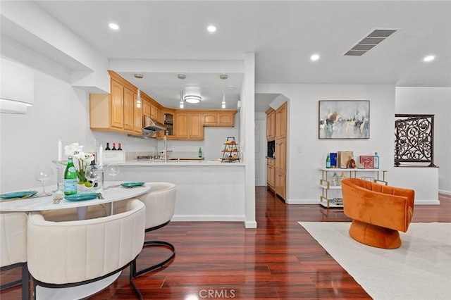 4906 W 5th St Unit C, Santa Ana, CA 92703 - dining space featuring dark wood-style floors, baseboards, and recessed lighting