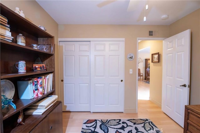 21357 Bermuda St, Chatsworth, CA 91311 - office featuring light wood-style flooring and ceiling fan