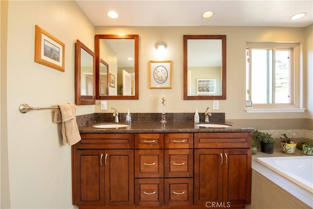 21357 Bermuda St, Chatsworth, CA 91311 - bathroom featuring double vanity, a garden tub, and recessed lighting