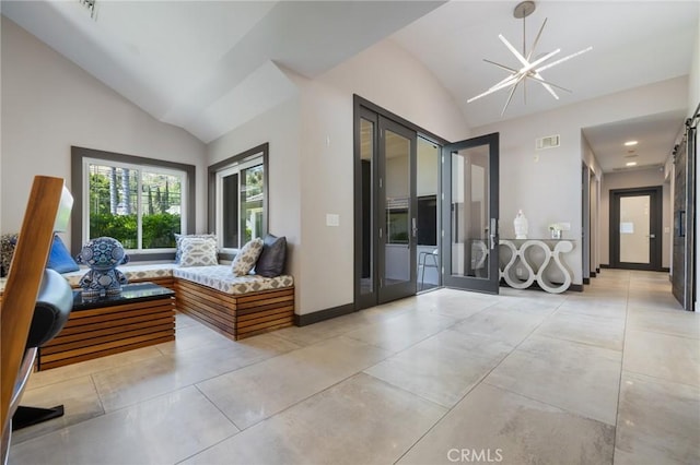 10372 Crawford Canyon Rd, North Tustin, CA 92705 - living room with vaulted ceiling, a chandelier, and baseboards