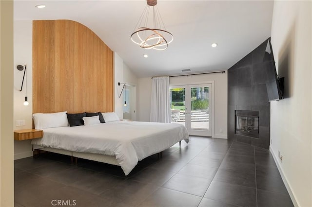 10372 Crawford Canyon Rd, North Tustin, CA 92705 - bedroom featuring access to outside, vaulted ceiling, a chandelier, a fireplace, and recessed lighting